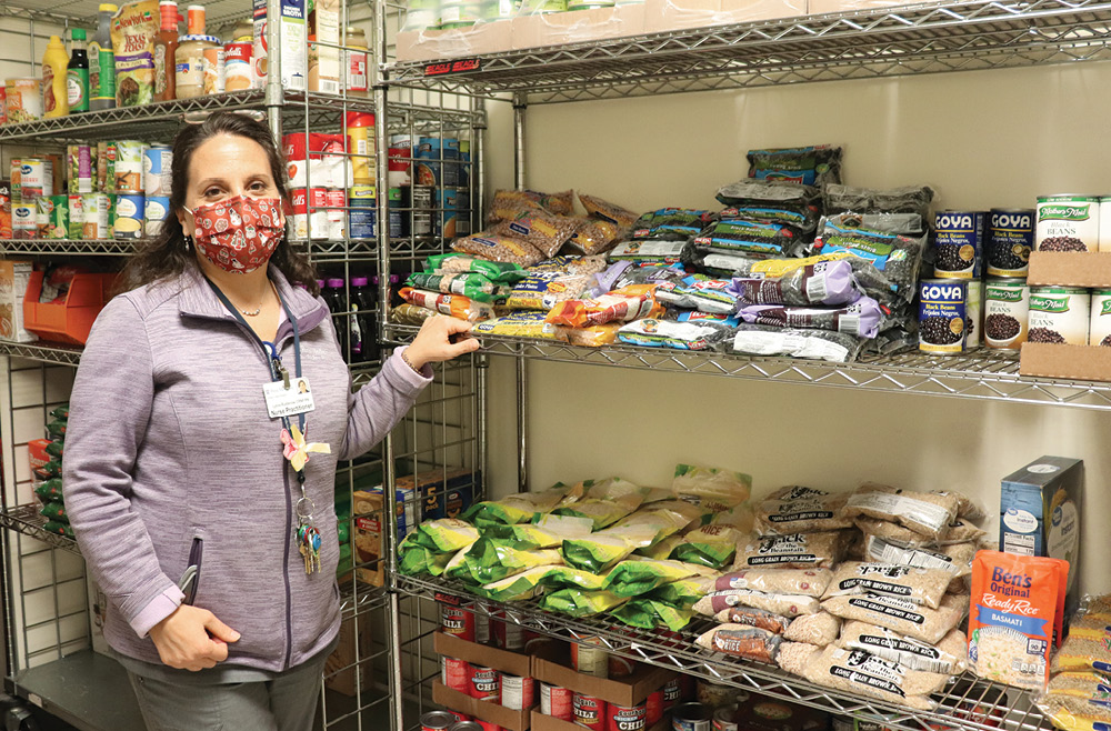 Lynne Rudderow in Chester County Hospital’s food pantry 